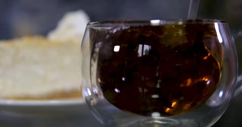 Brew black tea Serving cheesecake slice on plate. Classical new york cheesecake Stock Footage 291641586