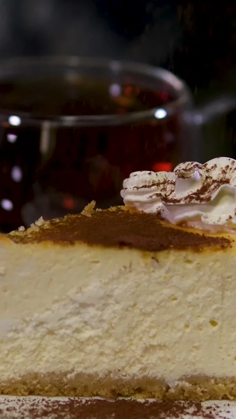 Brew black tea Serving cheesecake slice on plate. Classical new york cheesecake Stock Footage 292314509