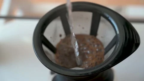 Brew coffee with a permanent filter and a carafe Stock Footage 132281724