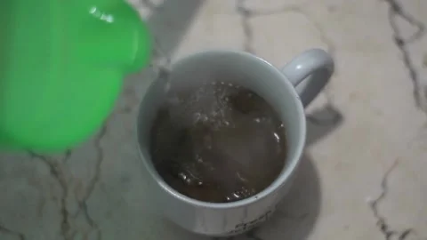 Brew coffee in a white cup with hot water Video stock 218070061