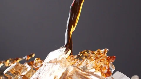 Brewed Coffee Being poured over Ice 1 Video stock 99125460