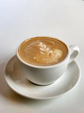 Brewed coffee. Brewed coffee in a white cup on a white background Foto stock