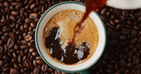 Brewed coffee in a coffee mug, top view, slow motion Stock Footage 168741875