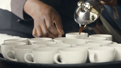 Brewed coffee poured into cups Stock Footage 104961027