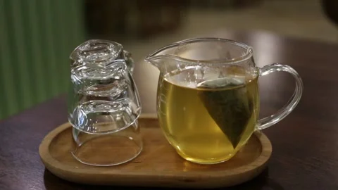 Brewed green tea in a bag Stock Footage 288326688