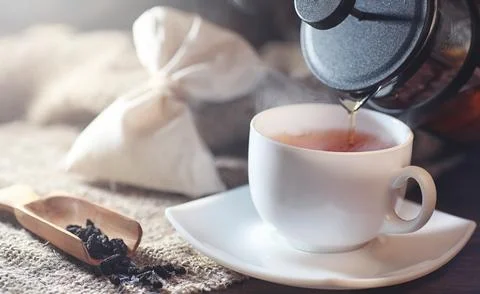 Brewed tea on a serving table Stock Photos