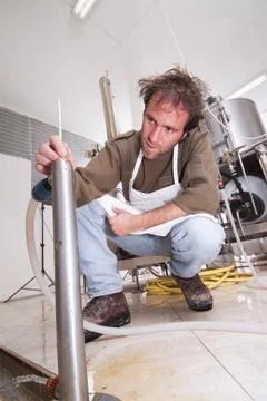 Brewer controls the temperature Stock Photos