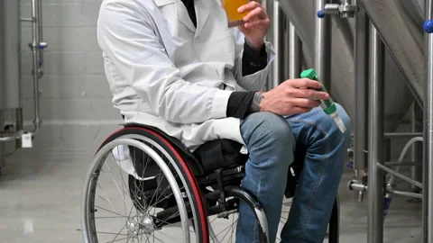 Brewer measuring pH in beer with digital meter. Stock Footage 194006931