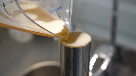 Brewer testing beer at brewery factory Stock Footage 127311018