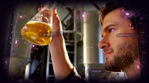 Brewery tech lifting flask, rotating, examining amber sample with REASON PATTERN Video stock 331789877