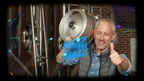 Brewery worker entering and lifting metal keg onto shoulder for positioning Stock Footage 331713651