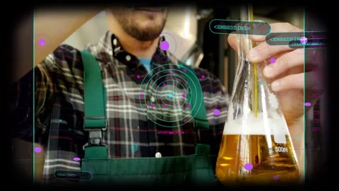 Brewery worker leaning forward, holding 500ml Erlenmeyer flask, inserting probe, Stock Footage 333004681