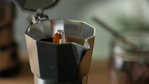 Brewing black moka coffee using moka coffee maker. Stock Footage 191632499