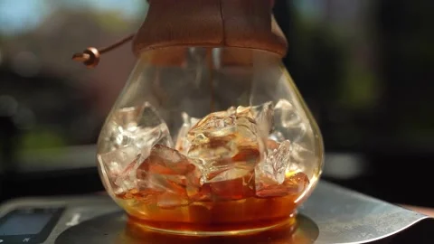 Brewing coffee with Chemex - Slow Motion Stock Footage 180877737