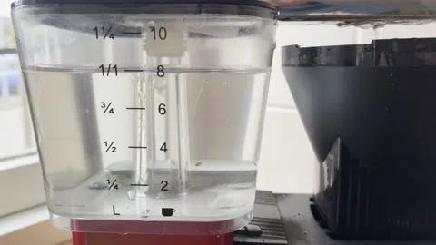 Brewing coffee with coffee machine water reservoir Stock Footage 233221757