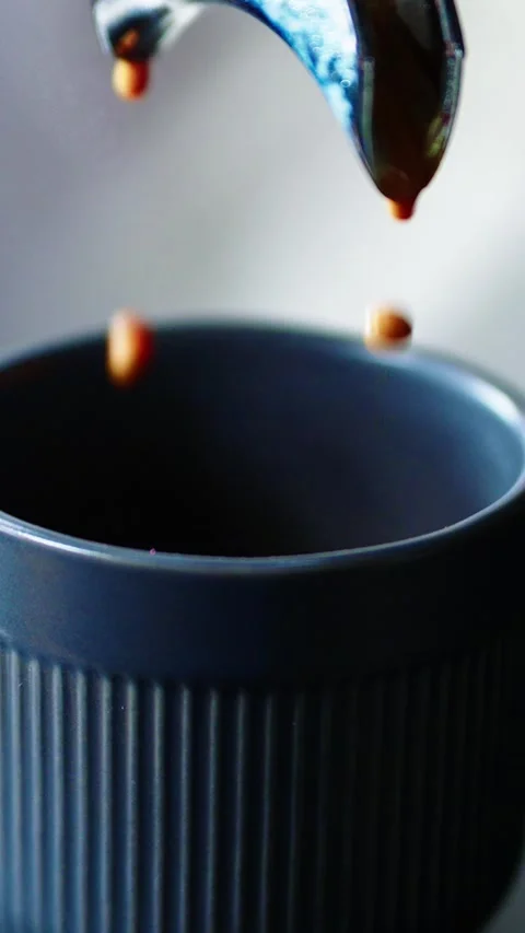 Brewing coffee with espresso machine for a rich cup in kitchen Stock Footage 342797442