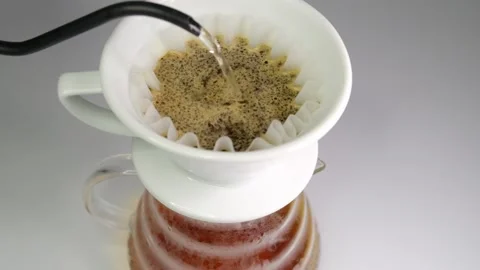 Brewing coffee with a kalita dripper Stock Footage 204845775