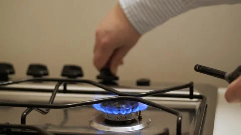 Brewing coffee in a moka pot before work Stock Footage 240141121