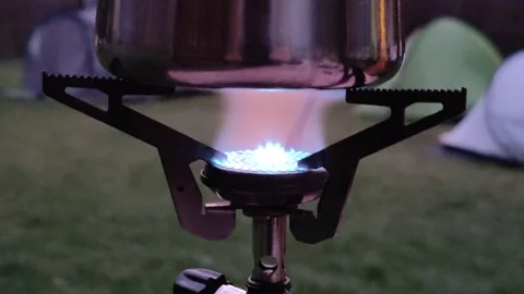 Brewing coffee in nature flame Video stock 286806953