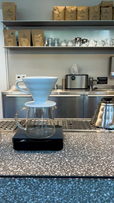 Brewing Coffee with Pour Over Method in Modern Caf Stock Footage 303891959