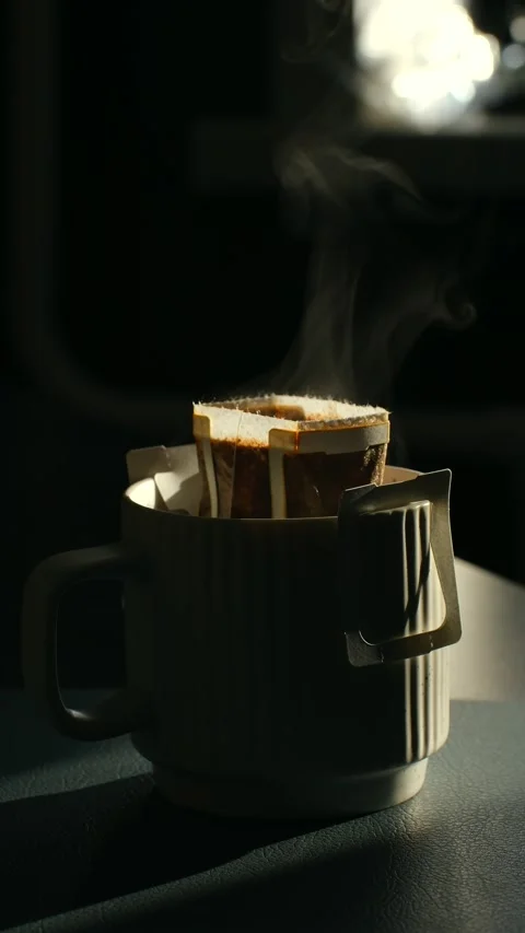 Brewing coffee with steam, Closeup of fresh brewed coffee and rising vapor 스톡 동영상 337546269