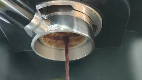 Brewing a coffee using coffee machine Stock Footage 280991527