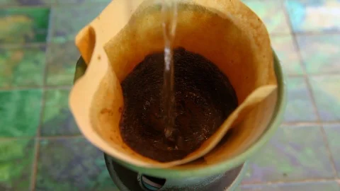 Brewing filter coffee on the table 스톡 동영상 100694241