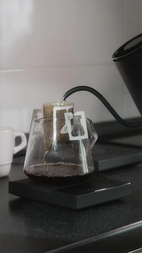 Brewing fresh drip coffee before work vertical lifestyle Stock Footage 338395164