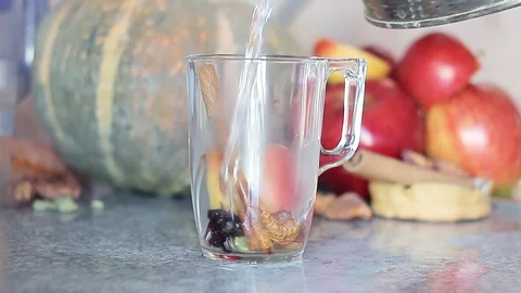 Brewing fruit tea with hibiscus and cinnamon Stock Footage 128255367