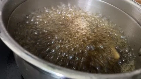 Brewing Indian tea in a pan Stock-Footage 142015630