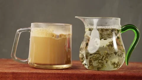 Brewing instant coffee and oriental tea with hot water. Stock Footage 346502997