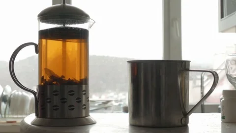 Brewing large-leaf tea in glass jug Stock Footage 124542512