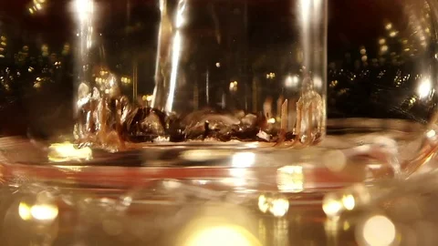 Brewing leaf tea in a transparent glass kettles. Slow motion Stock Footage 73634902