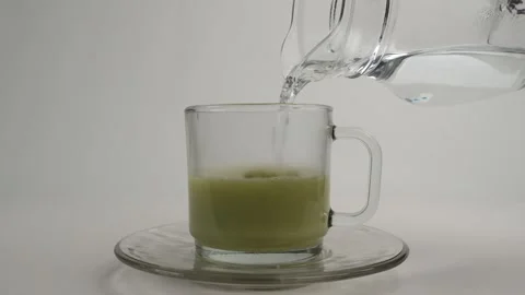 Brewing matcha or green tea with glass cup Stock Footage 278017995
