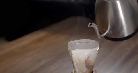 Brewing Pour Over Style of Coffee Making Dripping with Bubbles. Alternative Stock Footage 131128955