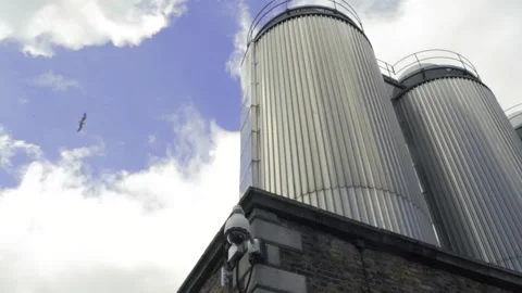 Brewing tanks from outside Stock Footage 133576146