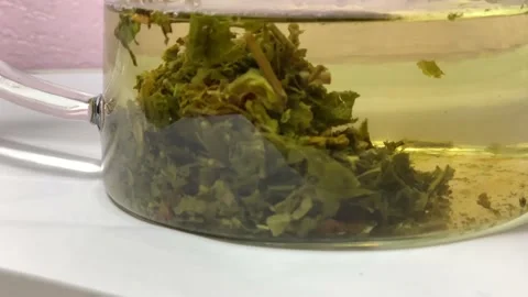 Brewing tea in a glass teapot Stock Footage 144467219