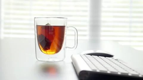 Brewing of Tea in an Office Stock Footage 55493451