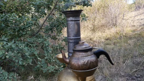 Brewing tea in samovar in nature_4K Stock Footage 126906557