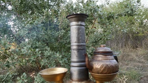 Brewing tea in samovar in nature_4K Stock Footage 126907785