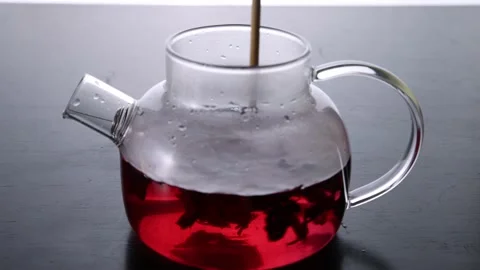 Brewing tea in a teapot Stock Footage 166107764