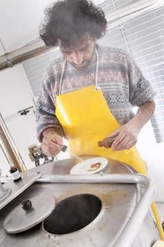 Brewmaster monitors the process Stock Photos
