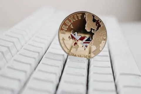 Brexit coin with map Foto stock