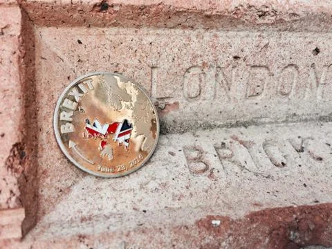 Brexit coin with map Stock Photos
