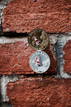 Brexit coins on the wall Stock Photos