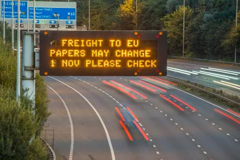 Brexit Freight UK Motorway Signage With Blurred Vehicles Stock Photos