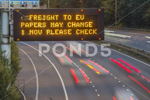 Brexit Freight UK Motorway Signage With Blurred Vehicles Stock Photos