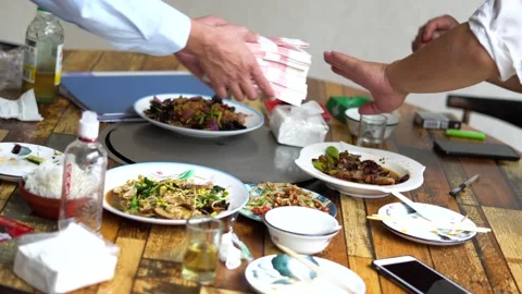 Bribe the leader to sign the contract during dinner Stock Footage 160417510