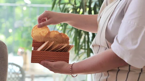 Bricelets thin, crispy Swiss wafers, traditionally served with coffee or Video stock 311946481