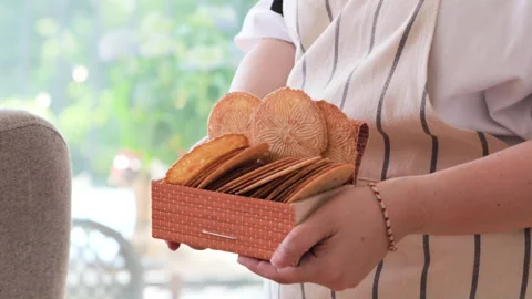 Bricelets thin, crispy Swiss wafers, traditionally served with coffee or Stock Footage 311946575
